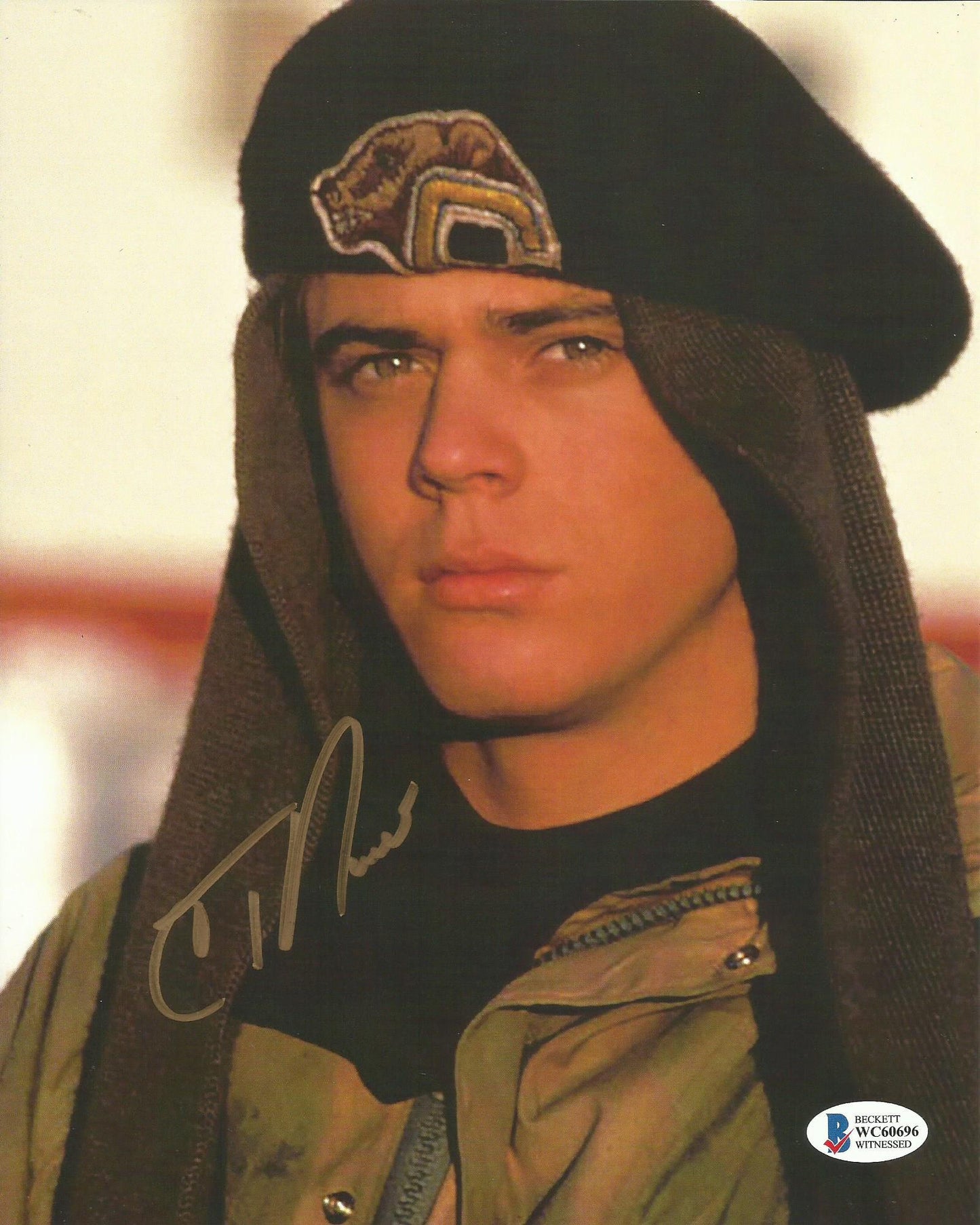 C THOMAS HOWELL SIGNED RED DAWN 8X10 PHOTO (1)