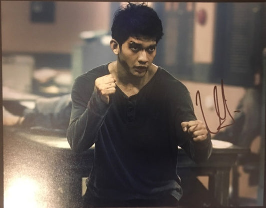 Iko Uwais signed The Raid 14x11  Photo