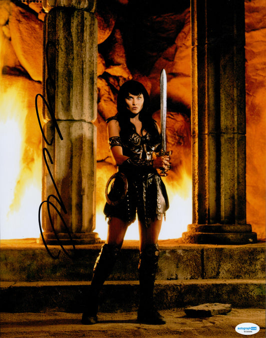 LUCY LAWLESS SIGNED LARGE XENA 14X11 PHOTO (1) ALSO ACOA