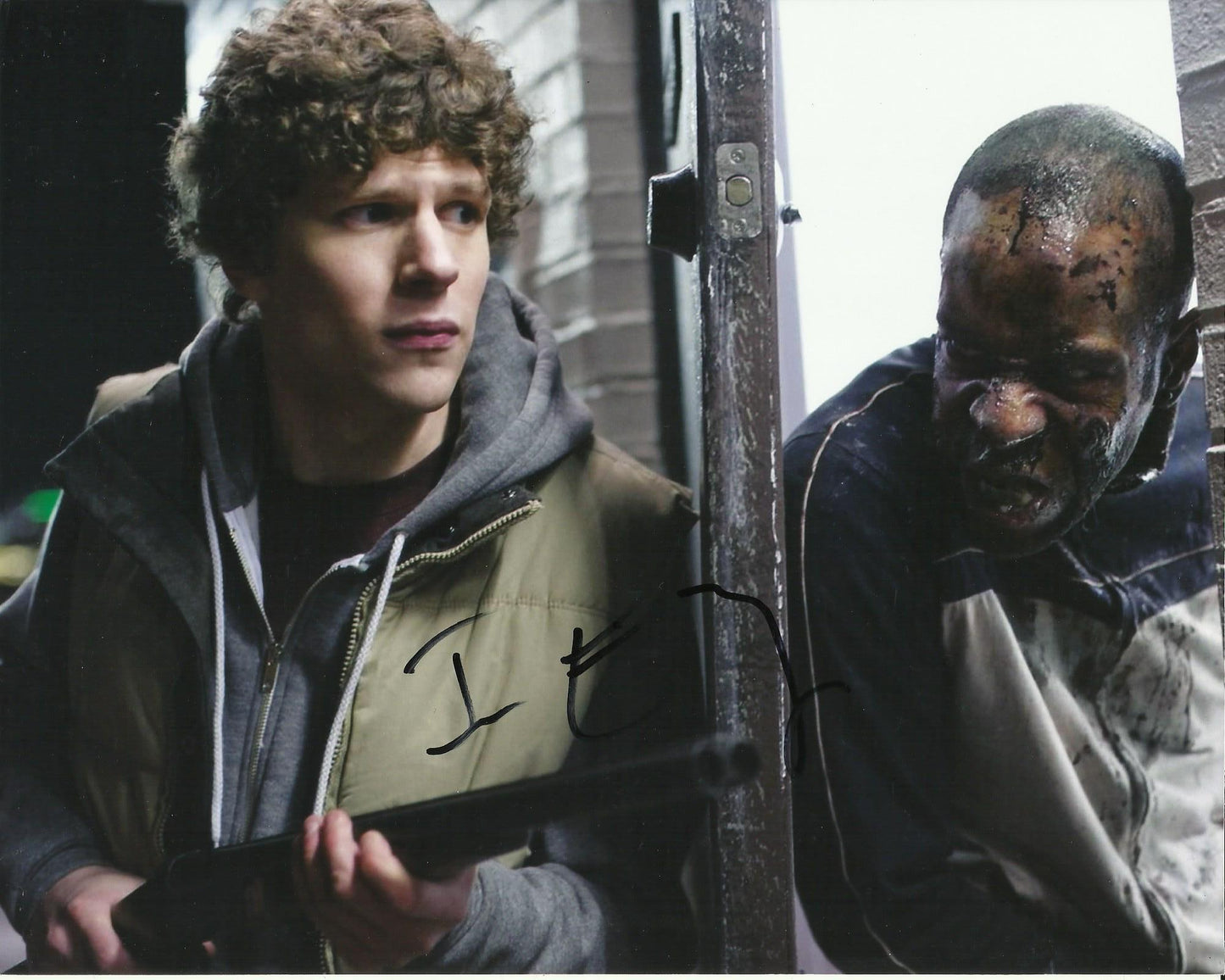 JESSE EISENBERG SIGNED ZOMBIELAND 8X10 PHOTO (2)