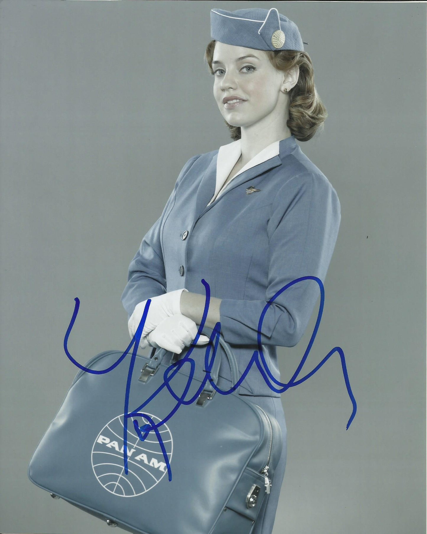 KELLI GARNER SIGNED SEXY PAN AM 10X8 PHOTO (1)