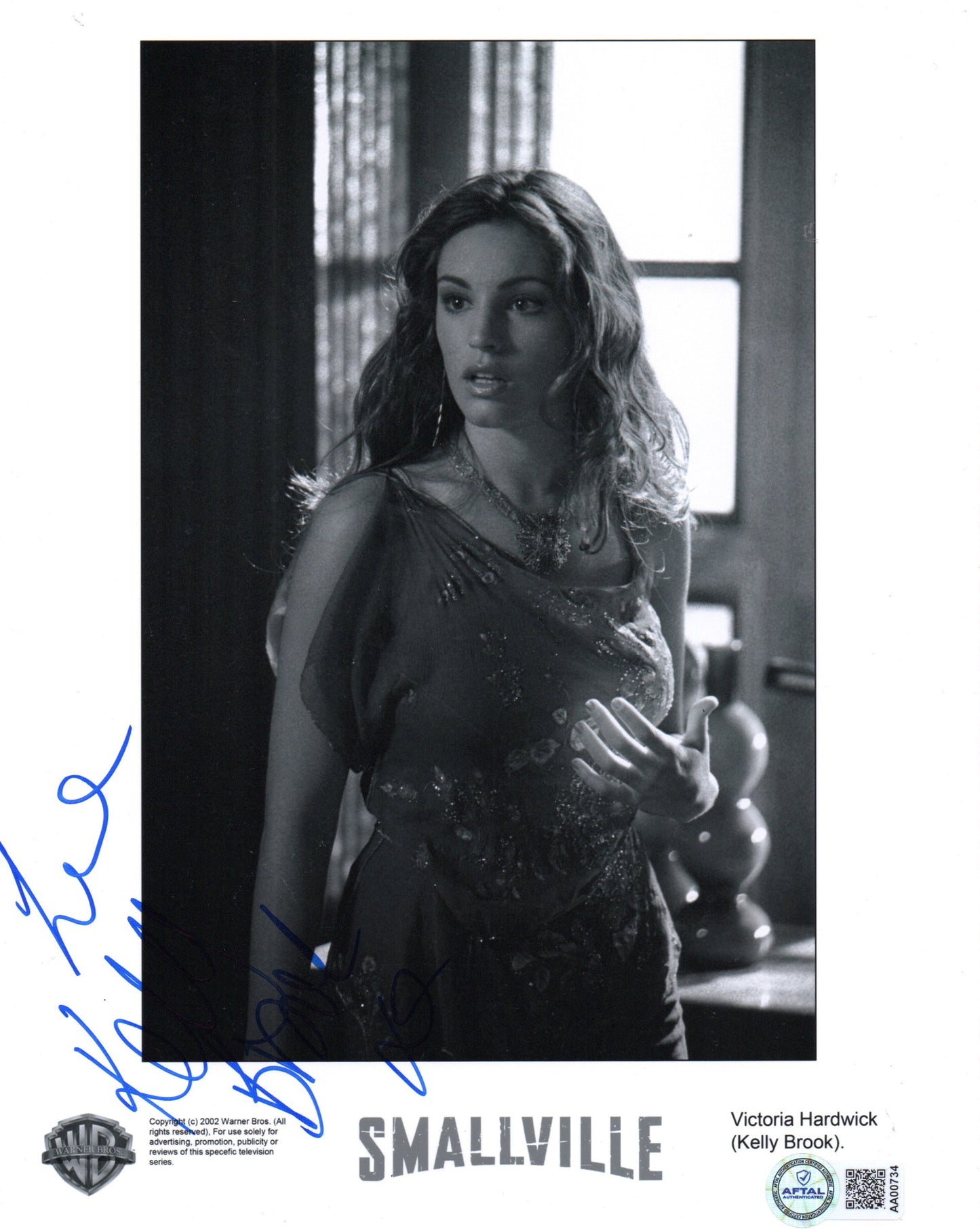 KELLY BROOK SIGNED SEXY SMALLVILLE 10X8 PHOTO (16) ALSO AFTAL AUTHENTICATION