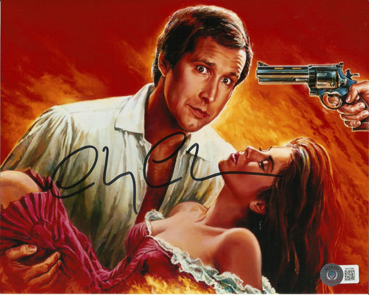 CHEVY CHASE SIGNED FLETCH 8X10 PHOTO (1) ALSO BECKETTS COA