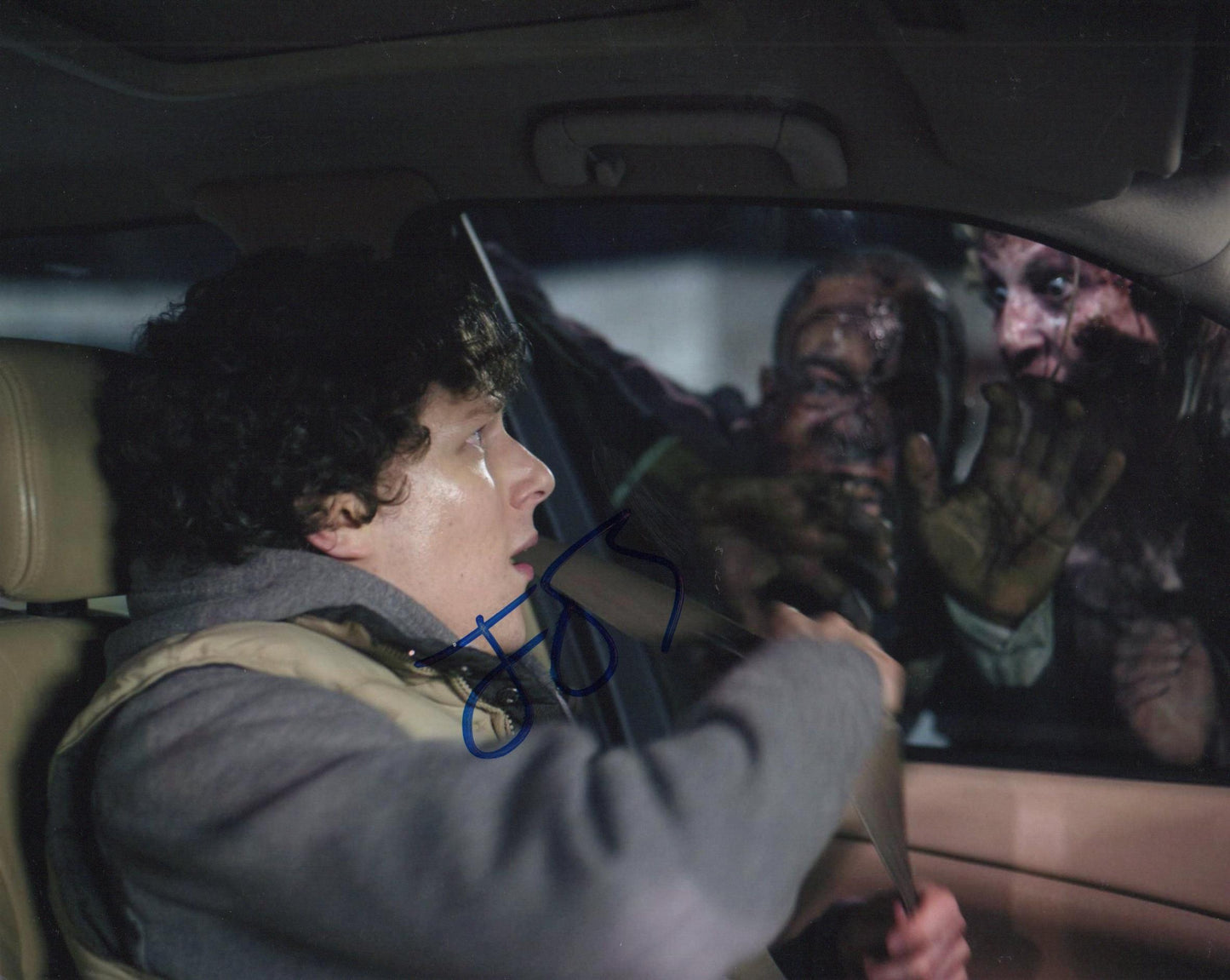 JESSE EISENBERG SIGNED ZOMBIELAND 8X10 PHOTO (1)