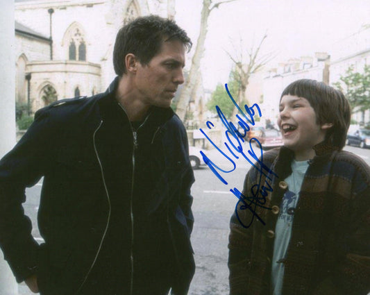 NICHOLAS HOULT SIGNED ABOUT A BOY 8X10 PHOTO (1) FULL SIGNATURE