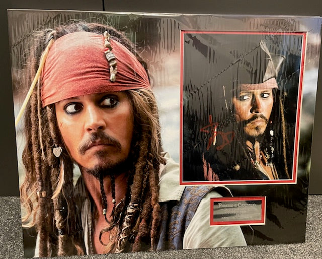 JOHNNY DEPP SIGNED PIRATES OF THE CARIBBEAN PHOTO MOUNT