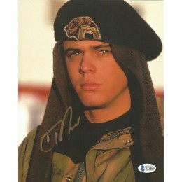 C THOMAS HOWELL SIGNED RED DAWN 8X10 PHOTO (1)